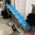 Inclined Conveyor with Adjustable Incline Angle.