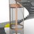 modern glass elevator with spiral staircase