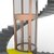 modern glass elevator with spiral staircase