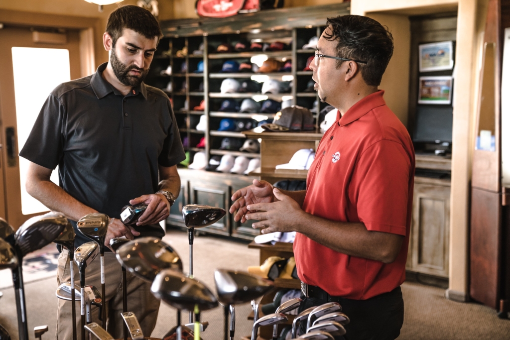 customer-explaining-golf-clubs-1325735 | Cad Crowd customer-explaining-golf-clubs-1325735